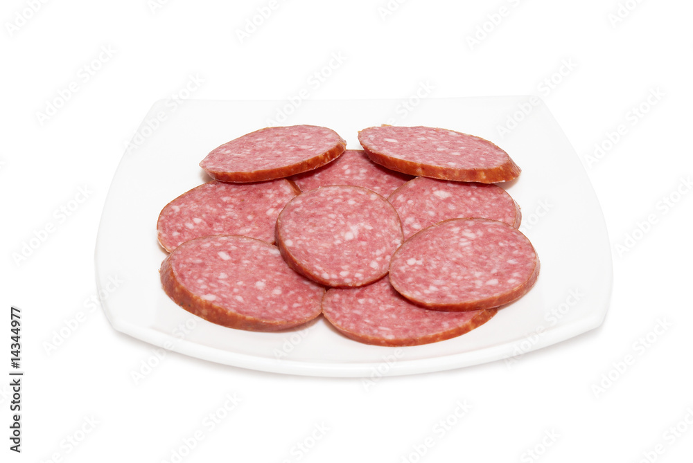 Sliced sausage on the plate