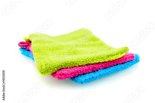Colorful washclothes isolated on white background