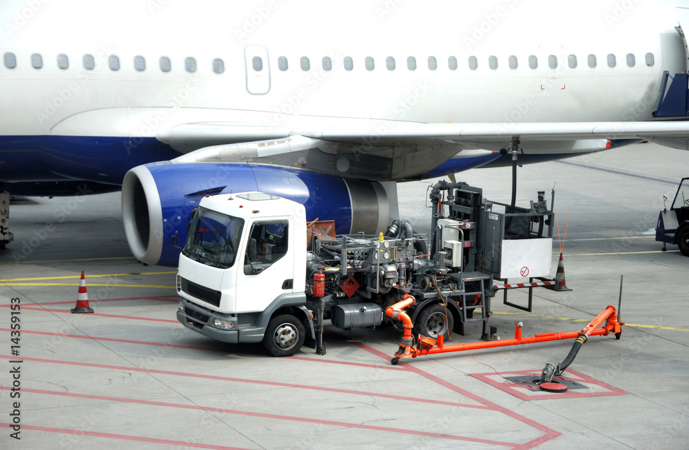 Fototapeta premium Refueling an airplane