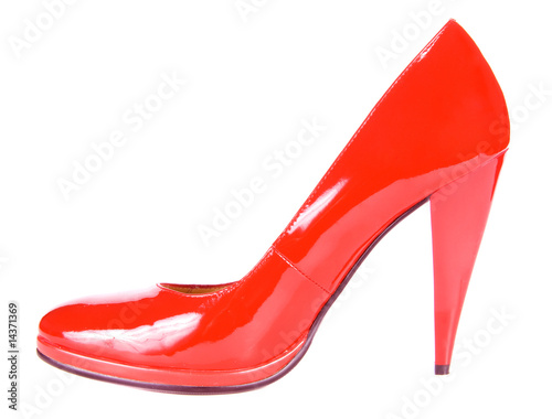 Beautiful red high-heeled shoe. Isolated on white