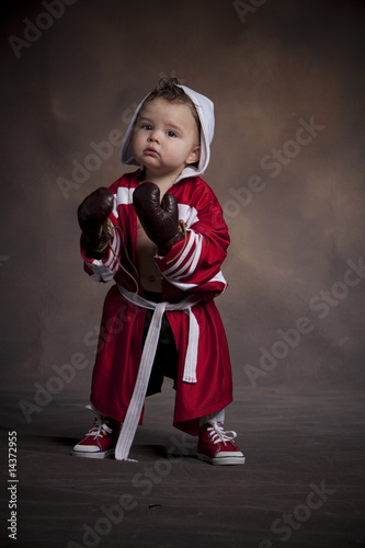 Little boxer with gloves and robe