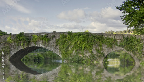 ancient bridge of felgueiras in the north of portugal photo