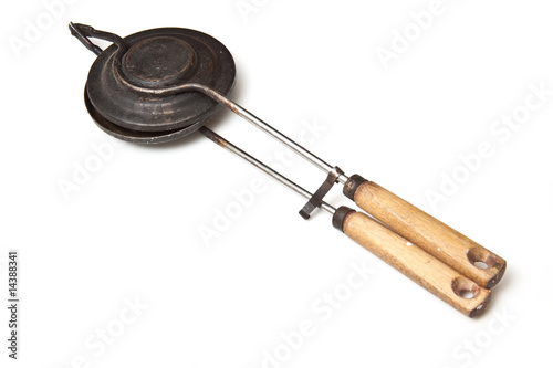 waffle iron isolated on a white studio background.