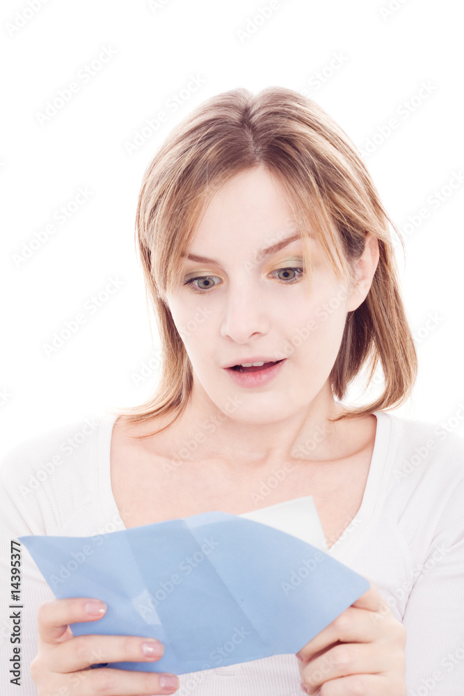 Portrait of young happy woman reading valentine card Portrait of young happy woman reading valentine card