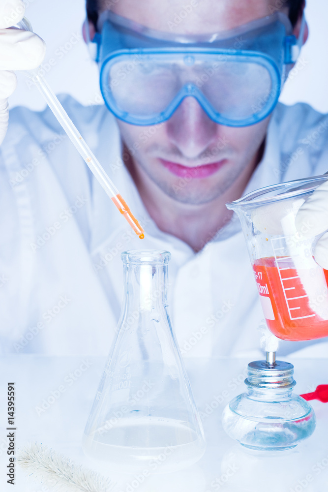 Man working in the chemistry laboratory Man working in the chemistry laboratory