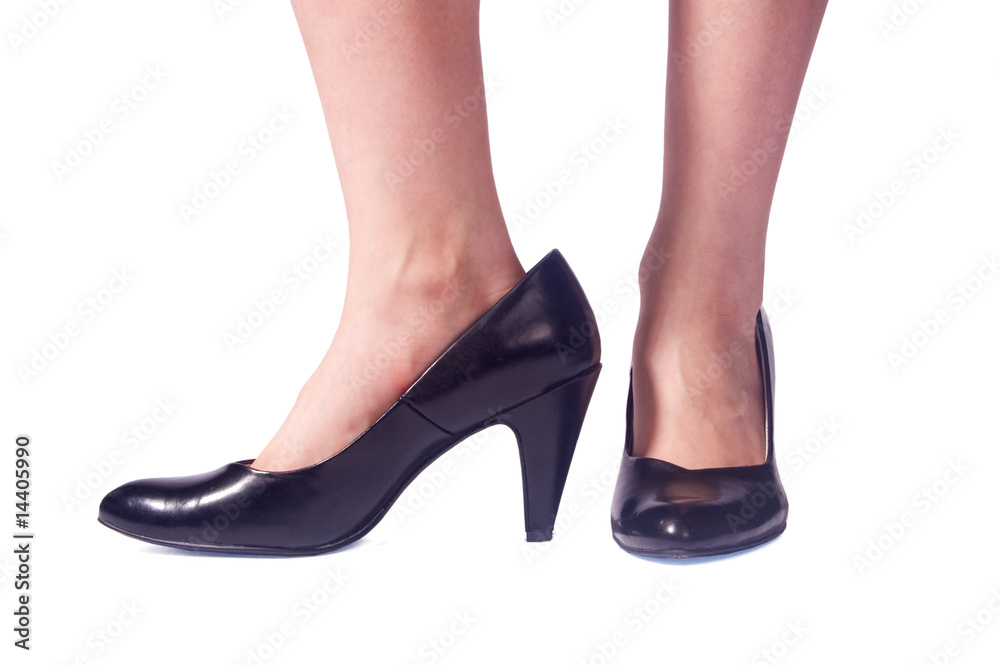 filling mommy's shoes isolated on a white background filling mommy's shoes isolated on a white background