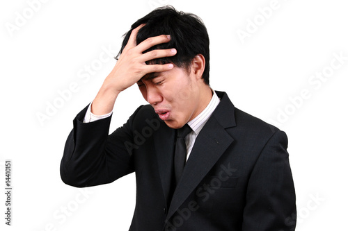 Young Asian Business man stressed