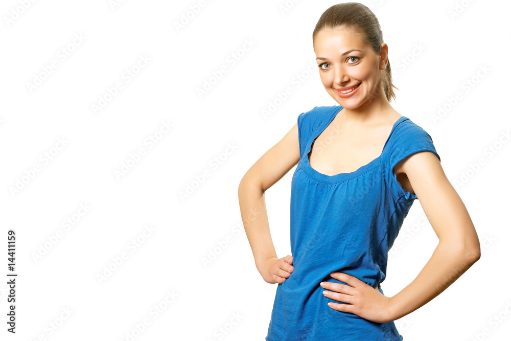 Young pretty woman in blue shirt with hands on a waist Young pretty woman in blue shirt with hands on a waist