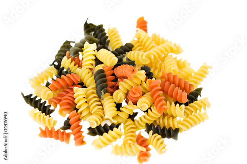 Tri colored rotini pasta on a white background photo