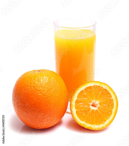 orange and juice in glass