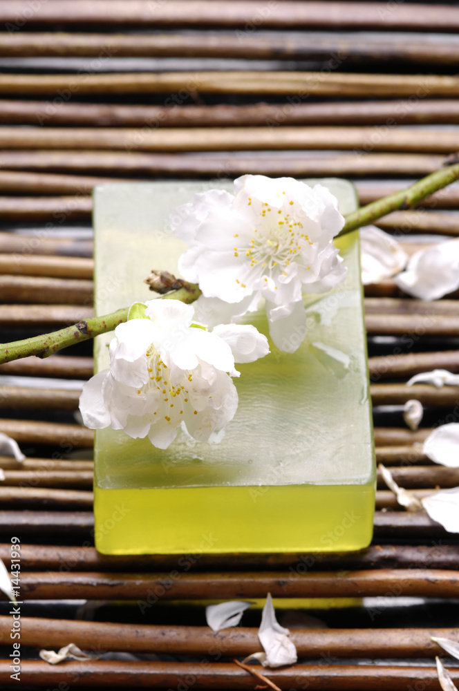Cherry with soap on bamboo mat