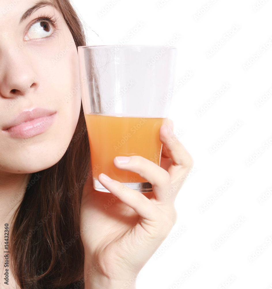 The girl with a glass of juice. The girl with a glass of juice.