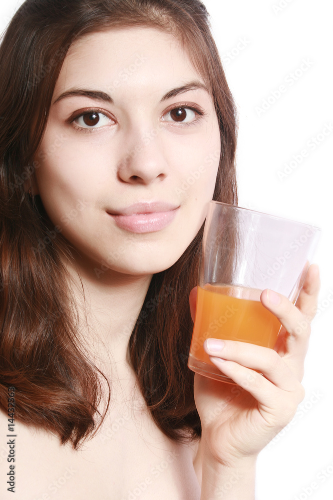 The girl with a glass of juice. The girl with a glass of juice.