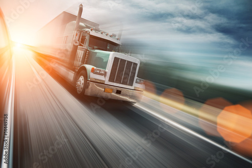 American truck on freeway, blurred motion