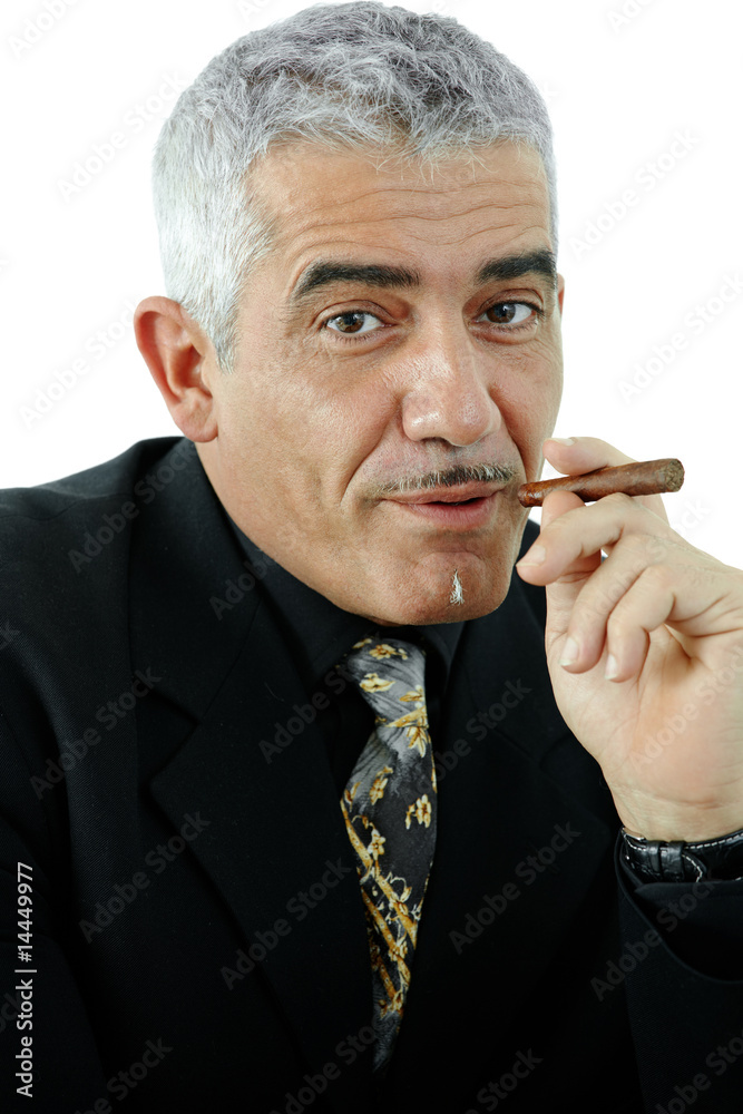 Businessman smoking cigar Businessman smoking cigar