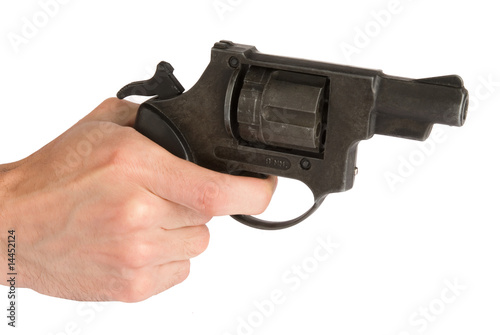Revolver in hand - isolated on white background