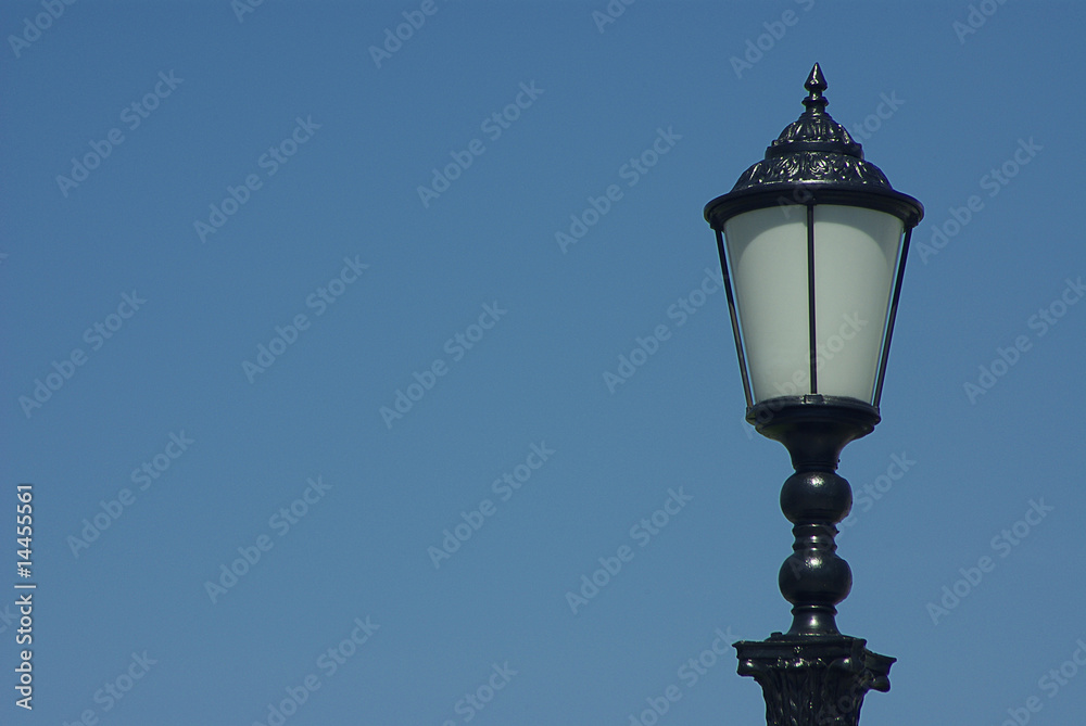 Lamp on blue sky background