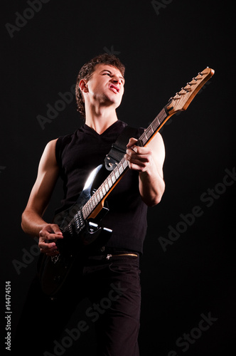emotional performer with guitar
