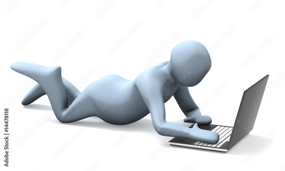 Man lying down with a laptop Man lying down with a laptop