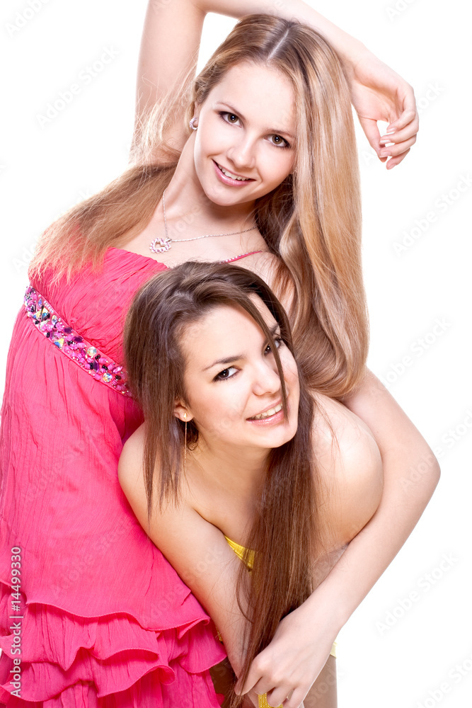 two beautiful women in a colored dress two beautiful women in a colored dress