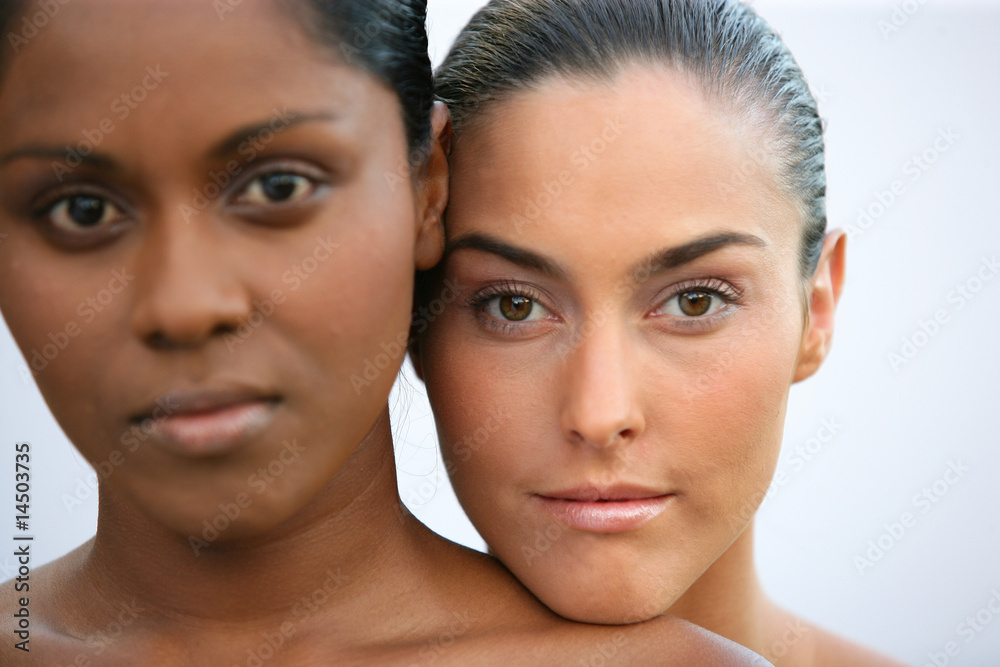 caucasian woman with mixed race woman