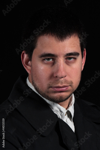 Male portrait isolated on black background