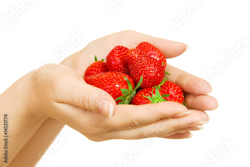 Woman palms with strawberries