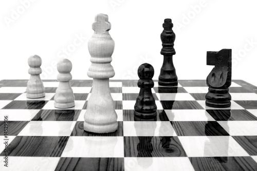 White king under attack by a black pawn