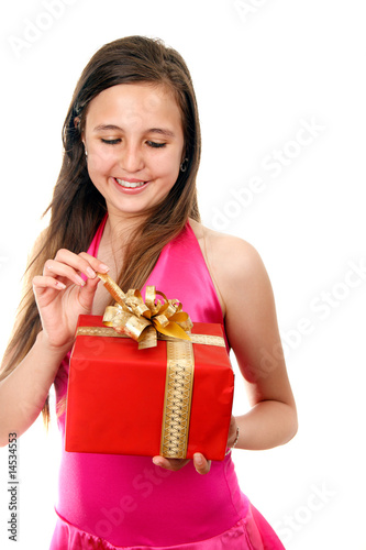 Happy girl holding a gift