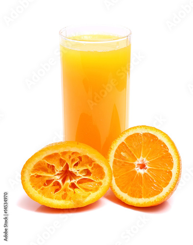 orange and juice in glass