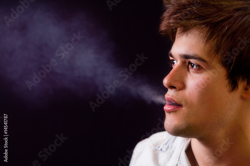 Cool man with smoke coming out of his mouth