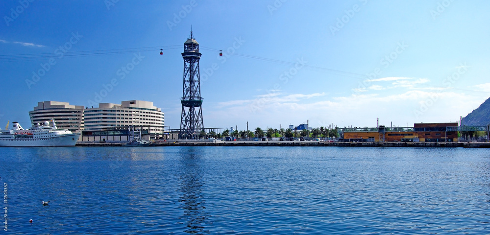 Panoramic cityscape of Barcelona harbour with ropeway. Spain, Eu