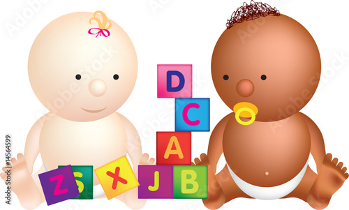 2 babies play with building blocks with letters on photo