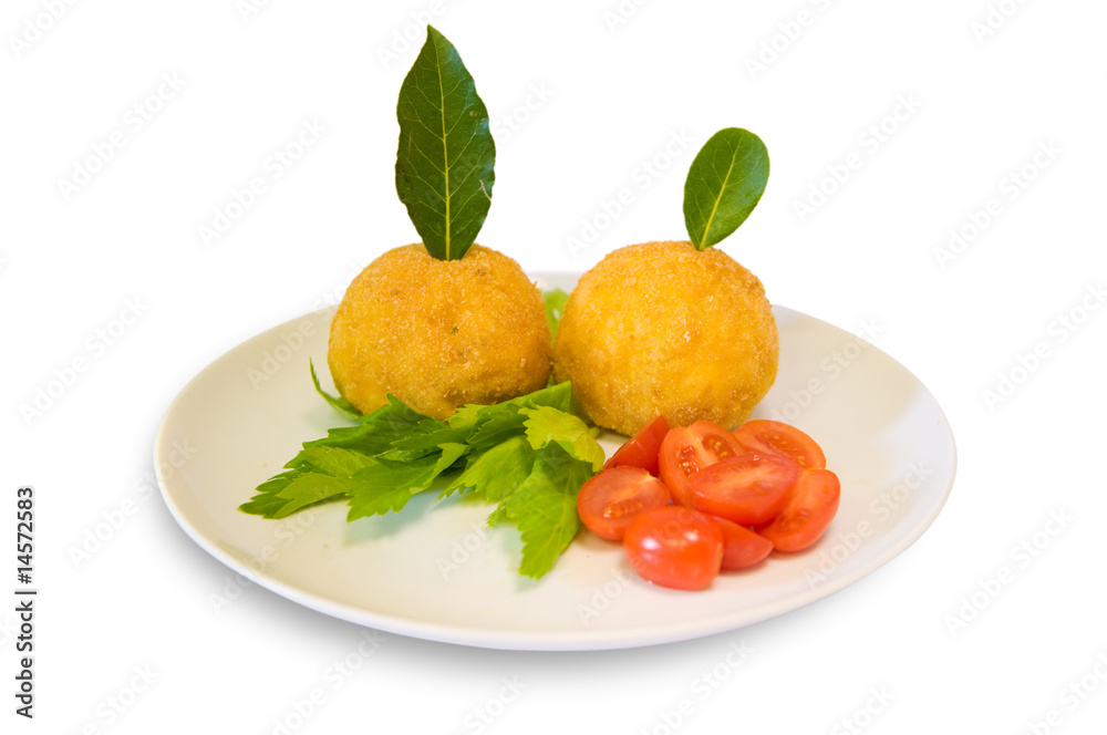 Rice meatballs decorated with cherry tomatoes and bay laurel Rice meatballs decorated with cherry tomatoes and bay laurel