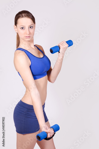 girl with dumbbell