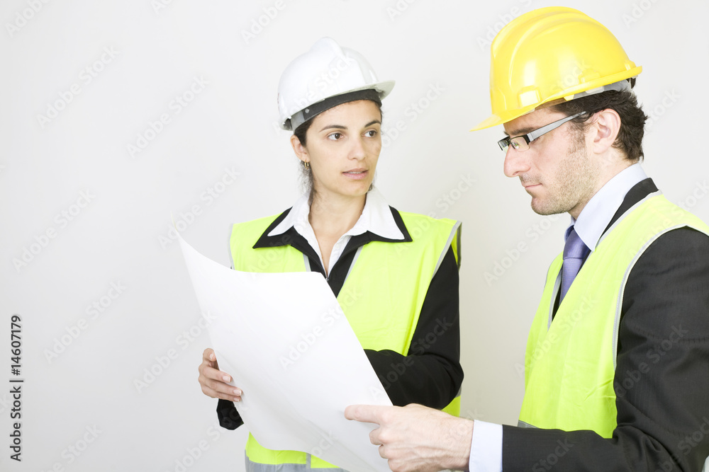 Engineer and client looking on site looking on a project