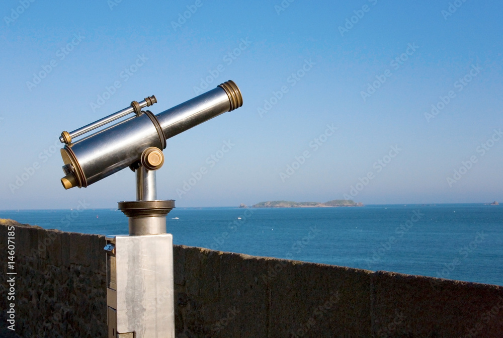 Coin operated viewfinder telescope overlooking sea shore Coin operated viewfinder telescope overlooking sea shore