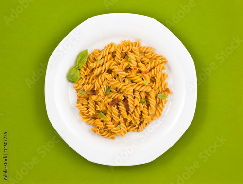 Italian pasta with tomato sauce and basil.