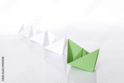 Winning green paper boat origami