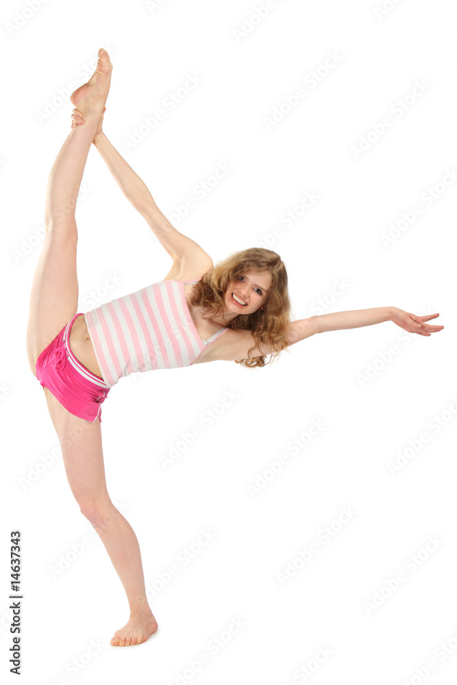 Happy girl in sportswear does gymnastic exercise Happy girl in sportswear does gymnastic exercise