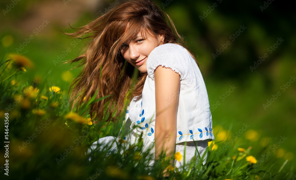 Young woman on a summer field Young woman on a summer field