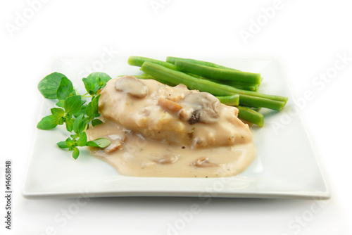 Chicken in Cream Sauce with Vegetables on White