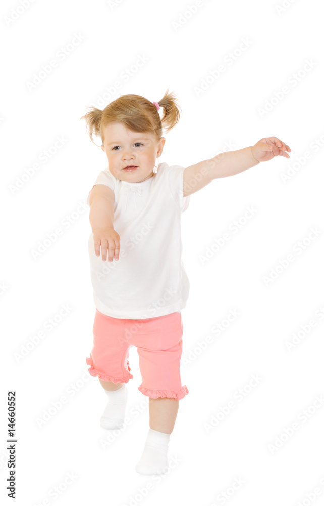 Small smiling girl make gymnastic exercise Small smiling girl make gymnastic exercise