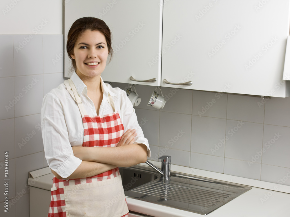 Woman alone in the kitchen Woman alone in the kitchen