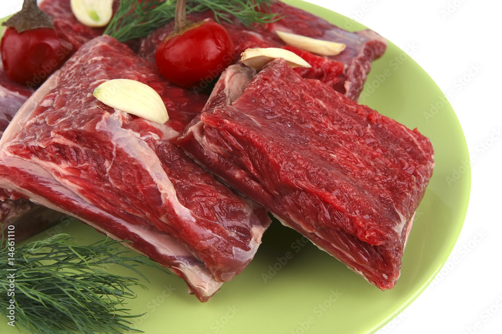 uncooked ribs on dish uncooked ribs on dish