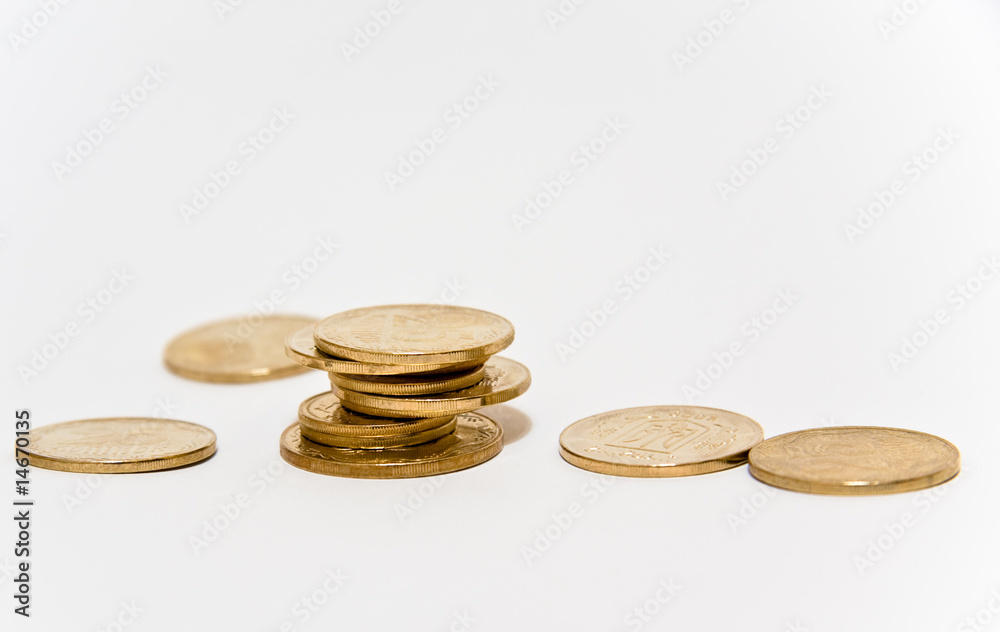 Golden coins isolated on white background Golden coins isolated on white background