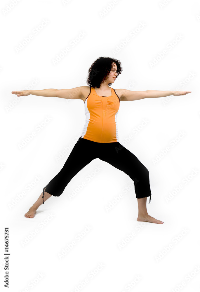 Young pregnant lady exercising yoga