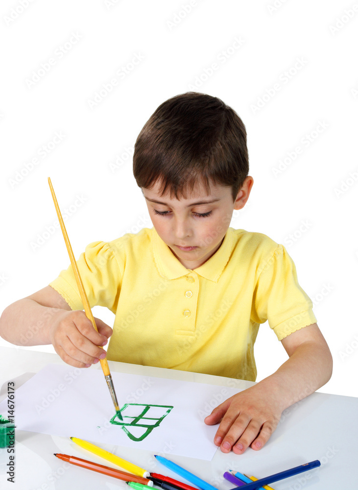 Little boy with crayons on a white background Little boy with crayons on a white background