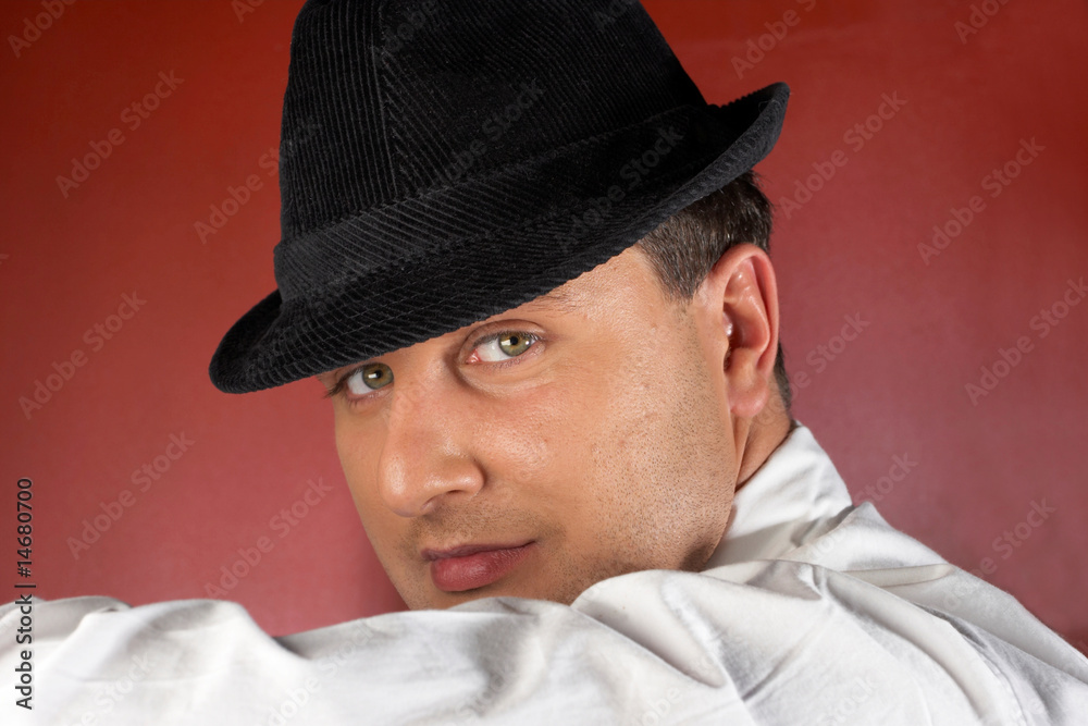 Close-up of a young man in a trilby Close-up of a young man in a trilby