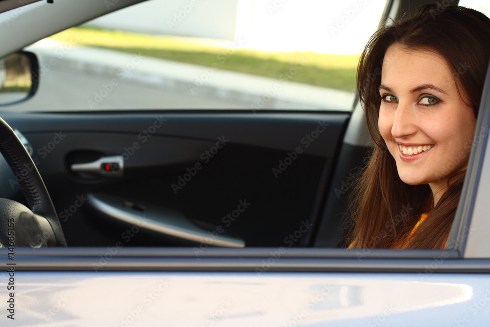 a young woman with her car